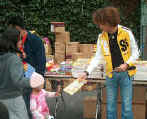 Corbin Bleu giving Cool Cat to a kid